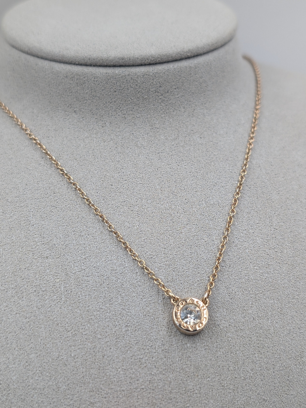 Coach Rose Gold Pendant Necklace with Clear Stone